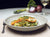Truite poêlée sauce teriyaki, bok choy, poireaux et oignons rouges au gingembre